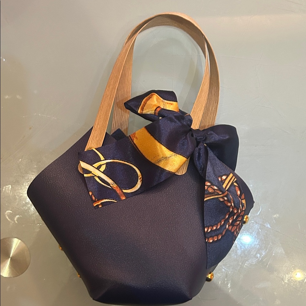 Small Elegant Navy Blue Handbag with Scarf Accent